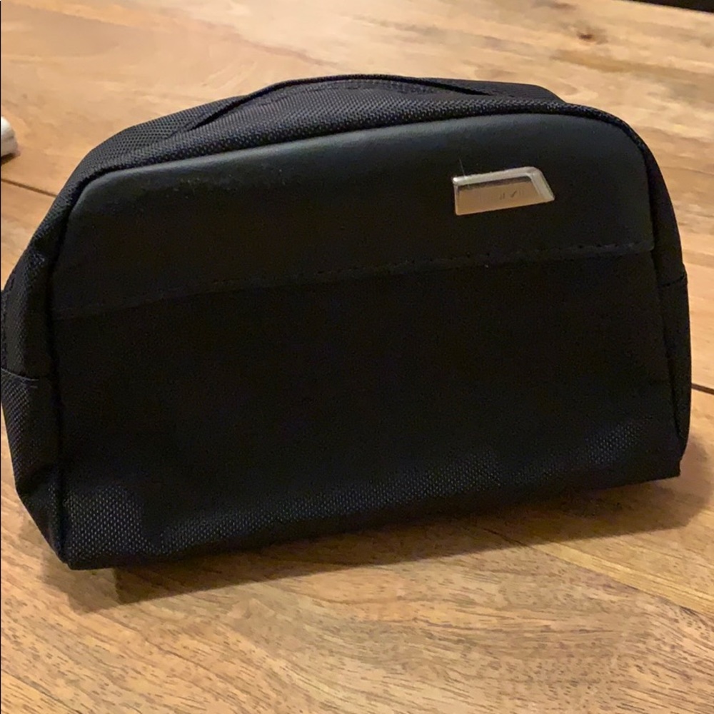 Small TUMI toiletry bag